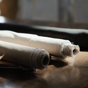 A close up of two rolled up paper